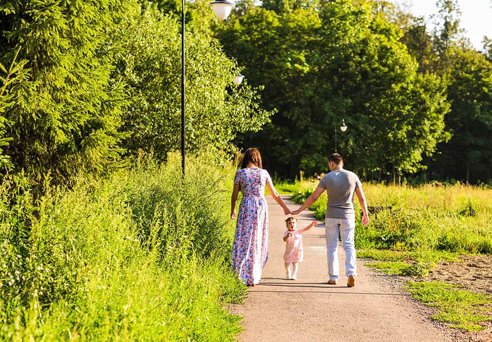 family walking in park